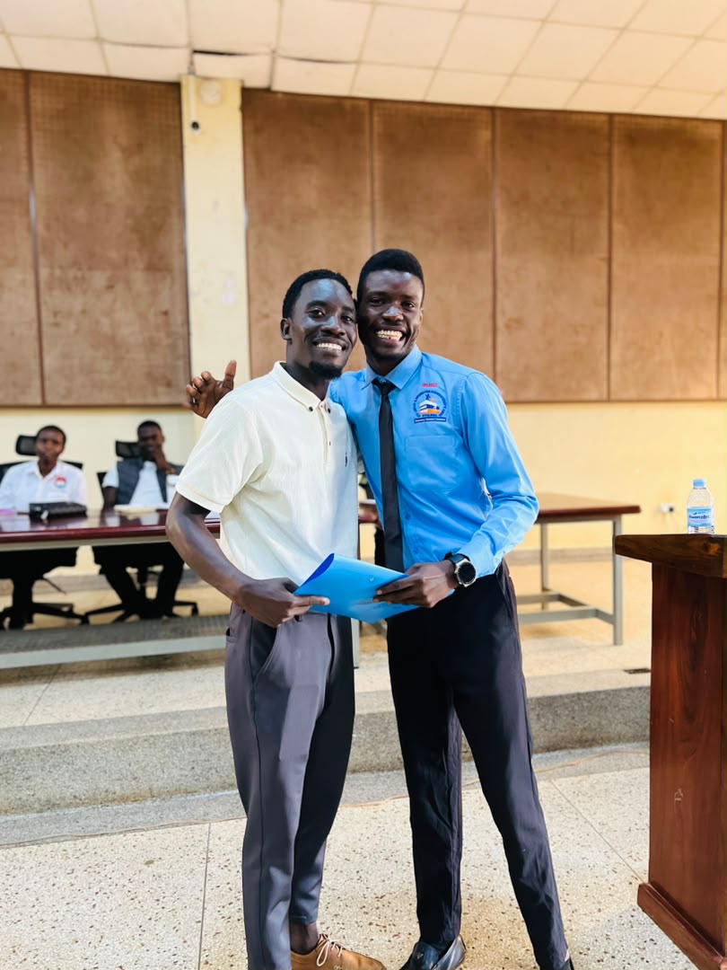 Student receiving a certificate at the association event