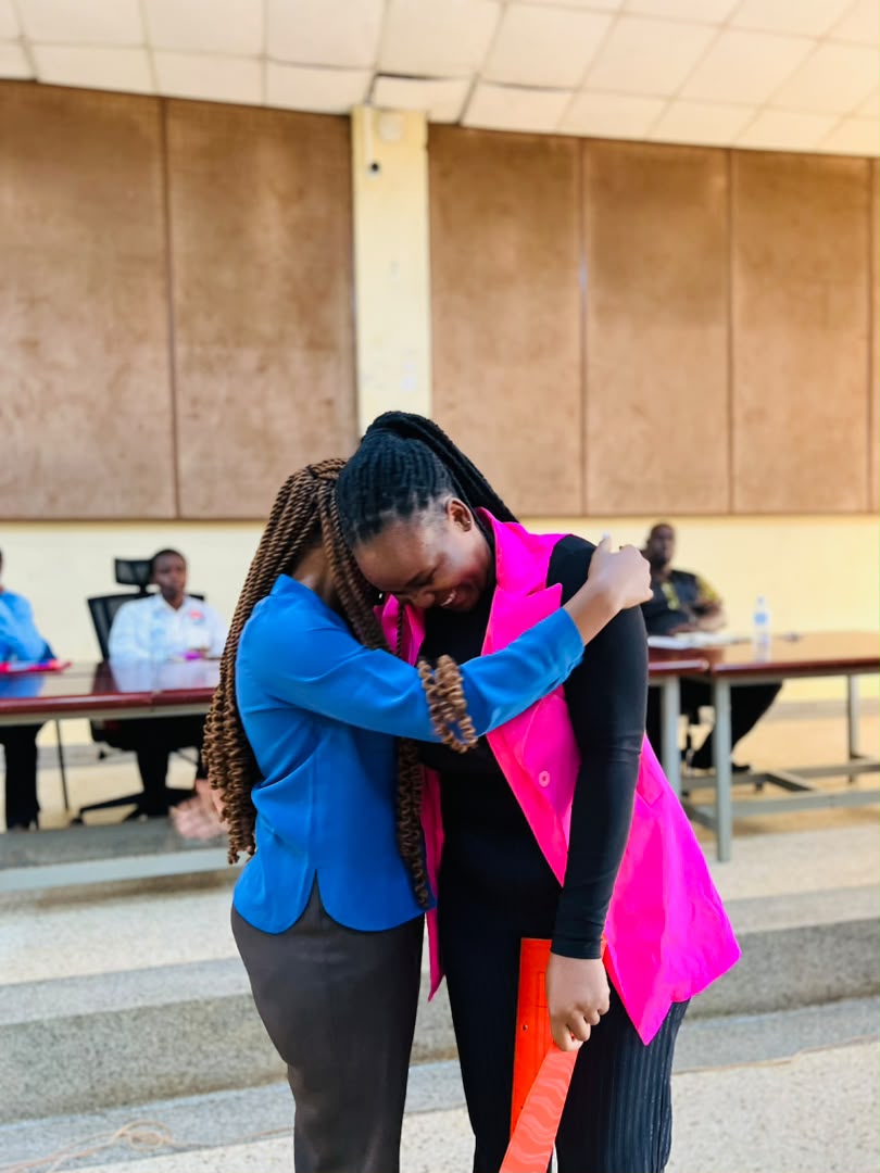 Students sharing a ceremony moment at the association event